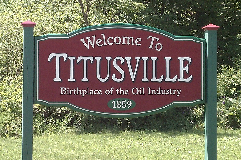 Green and Red "Welcome to Titusville" sign